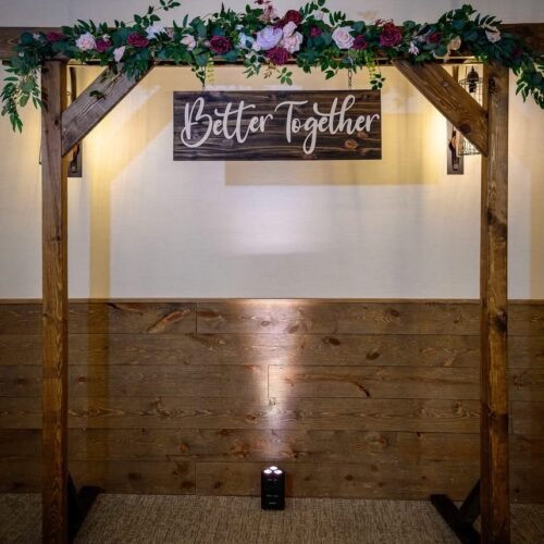 RUSTIC WOOD ARCH WITH FLOWERS